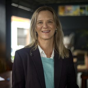 Woman wearing formal on a blurred background